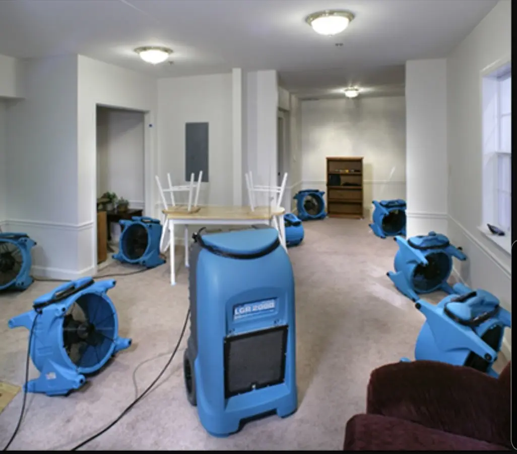 Air movers and dehumidifier setup for Water Damage Restoration in Headland